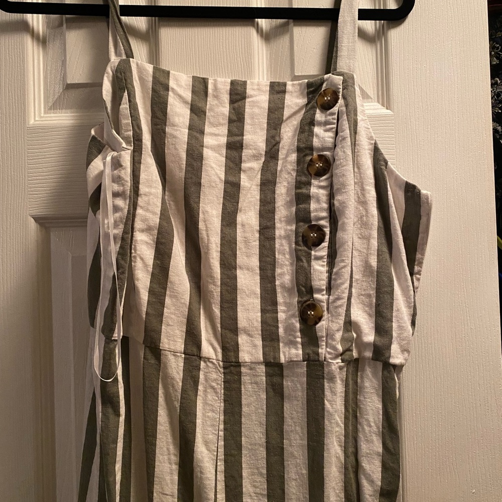 Green and white stripe linen jumpsuit.